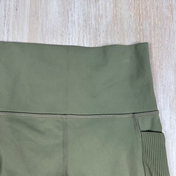 Athleta Salutation Stash Pocket II Laser Cut 7/8 Tight Olive Green Leggings XS - Picture 3 of 16
